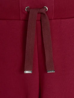 Spodnie*Tommy Hilfiger Joggery Z Haftowanym Emblematem ROUGE