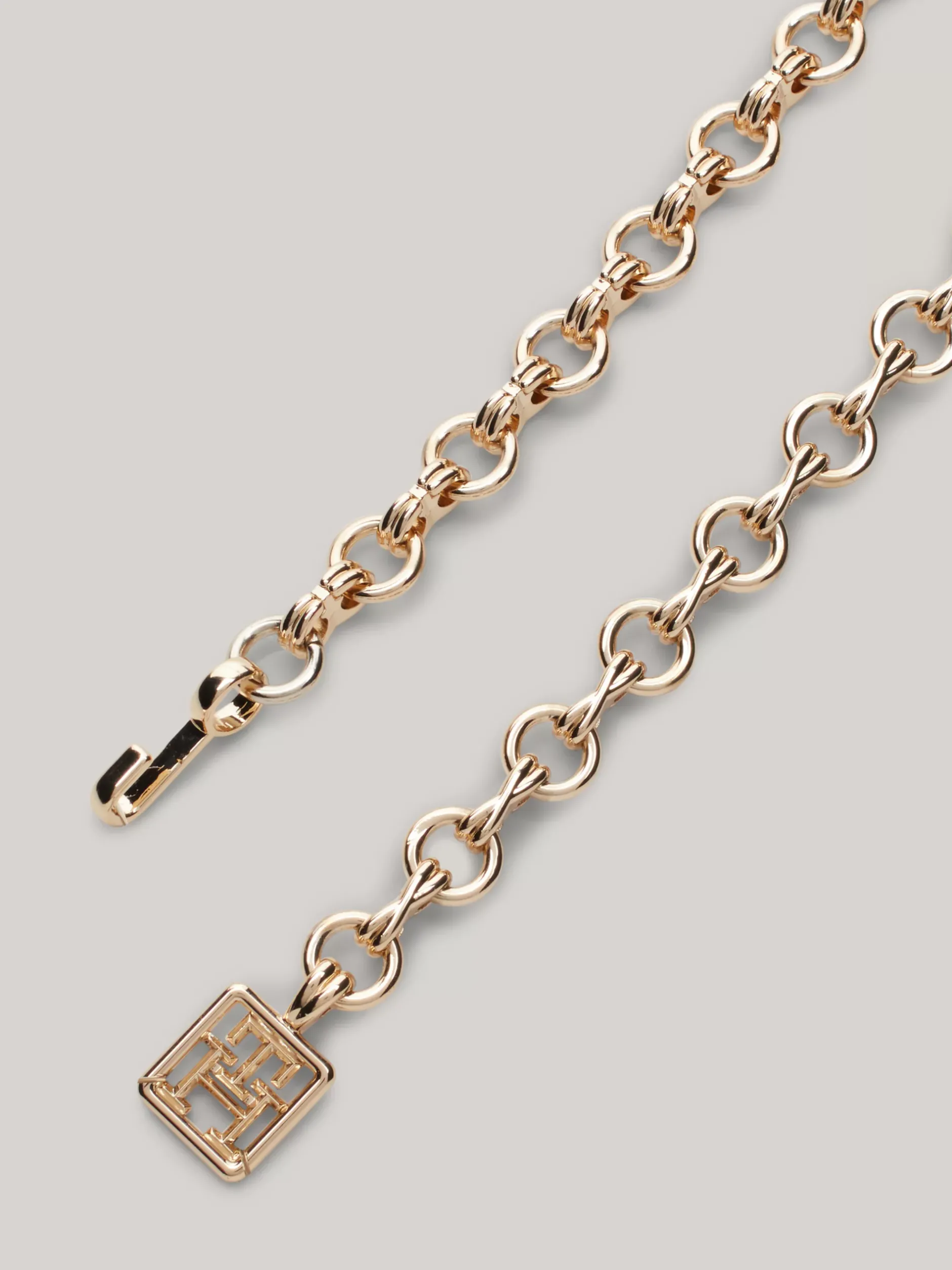 Paski*Tommy Hilfiger Pasek Z łańcuszka Z Monogramem TH GOLD ALLOVER 01